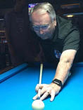Pastor Robert Ryder wearing billiard glasses by Curran Opticians